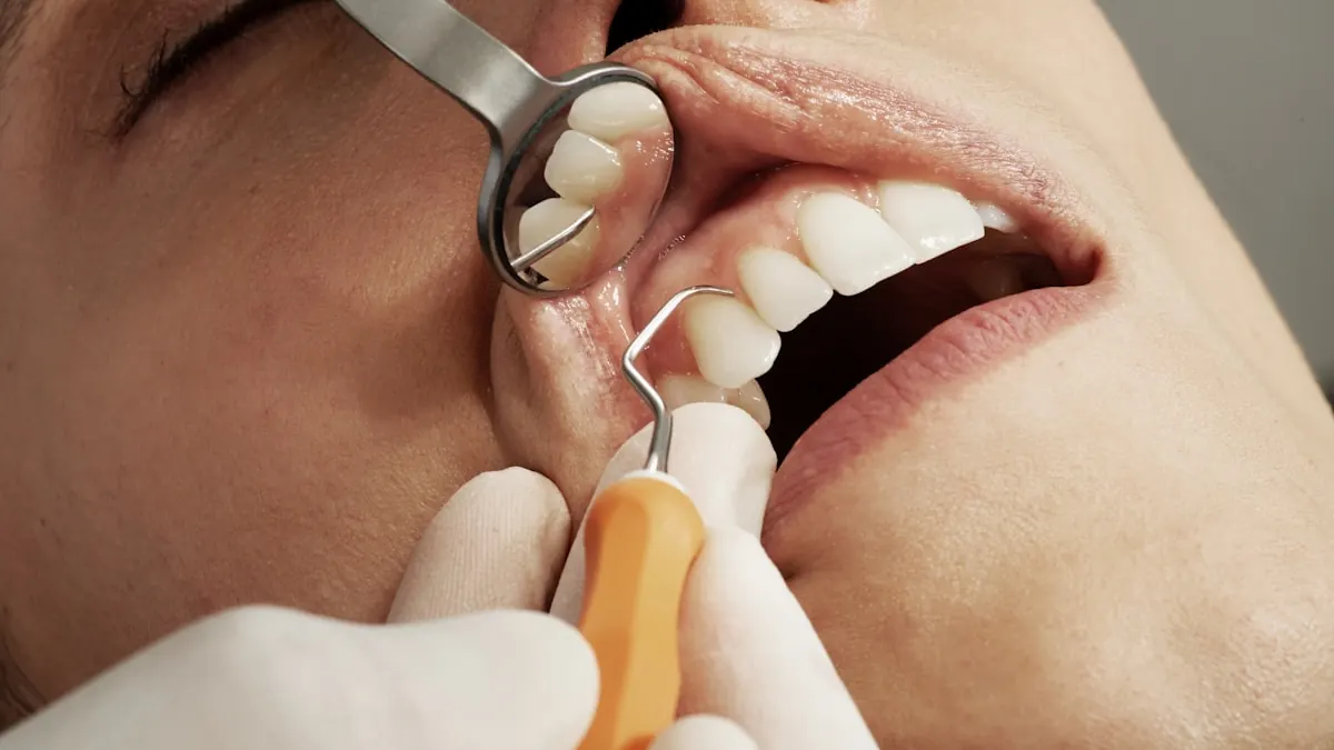 Dental air polishing handpiece in use